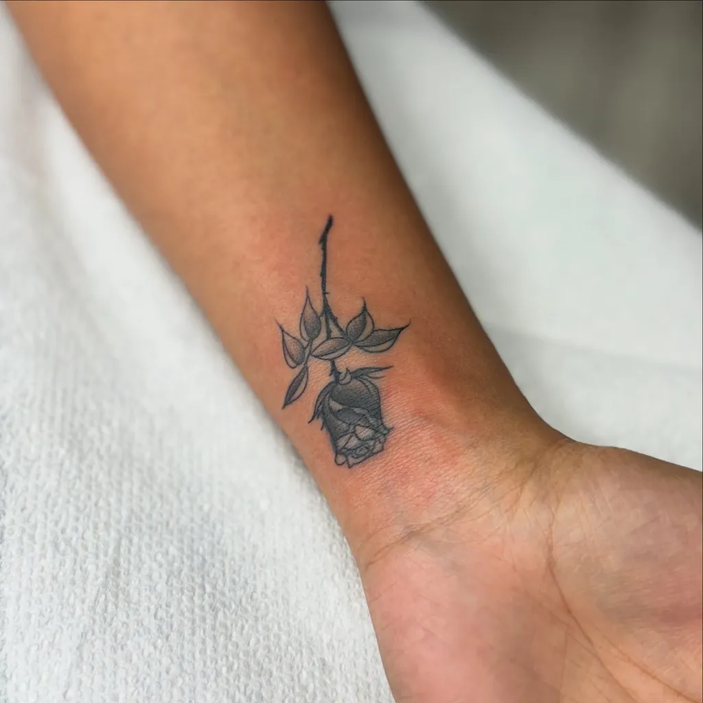 Black Rose Tattoo on Hand