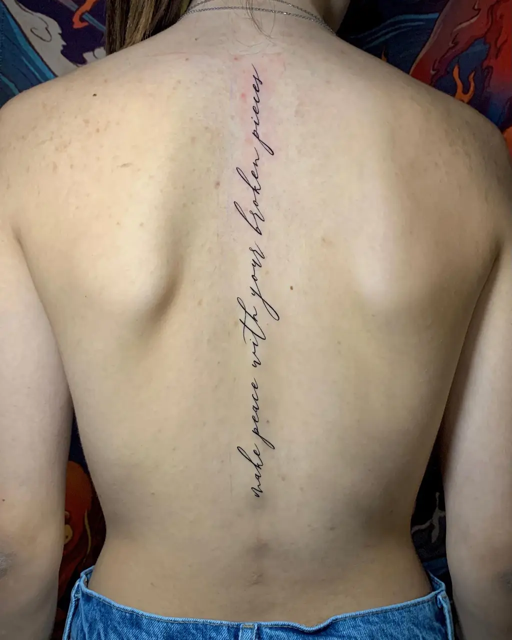 Script Tattoo on Spine