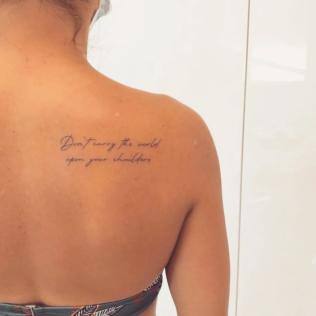 Script Quote Tattoo on Shoulder Blade