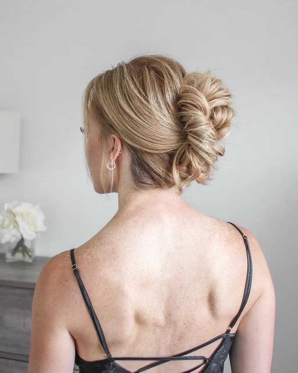 Sleek Low Bun with Twists