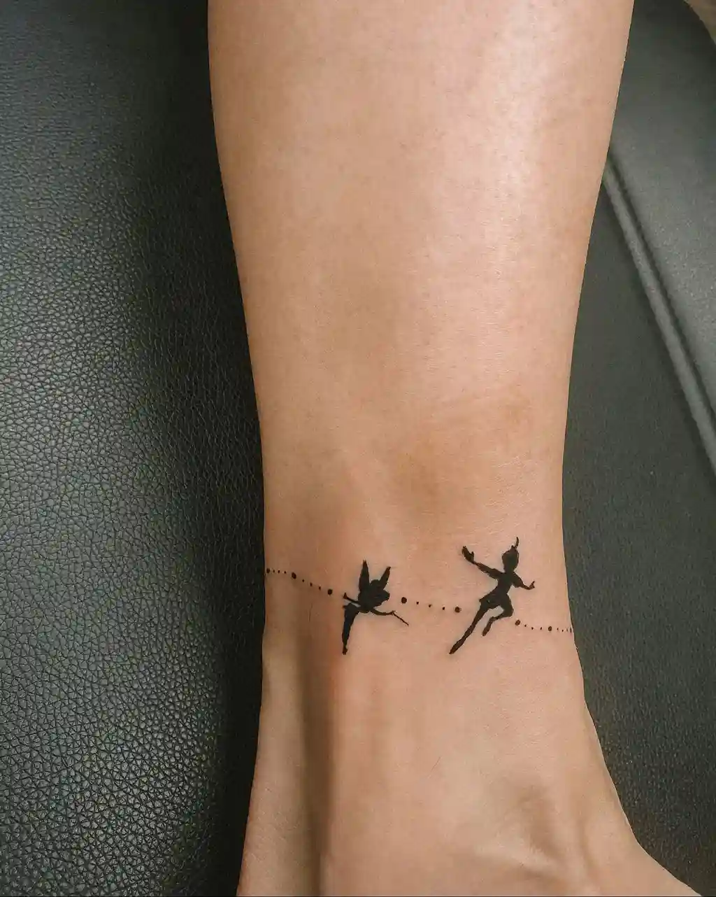 Silhouette Fairy Tattoo on Ankle