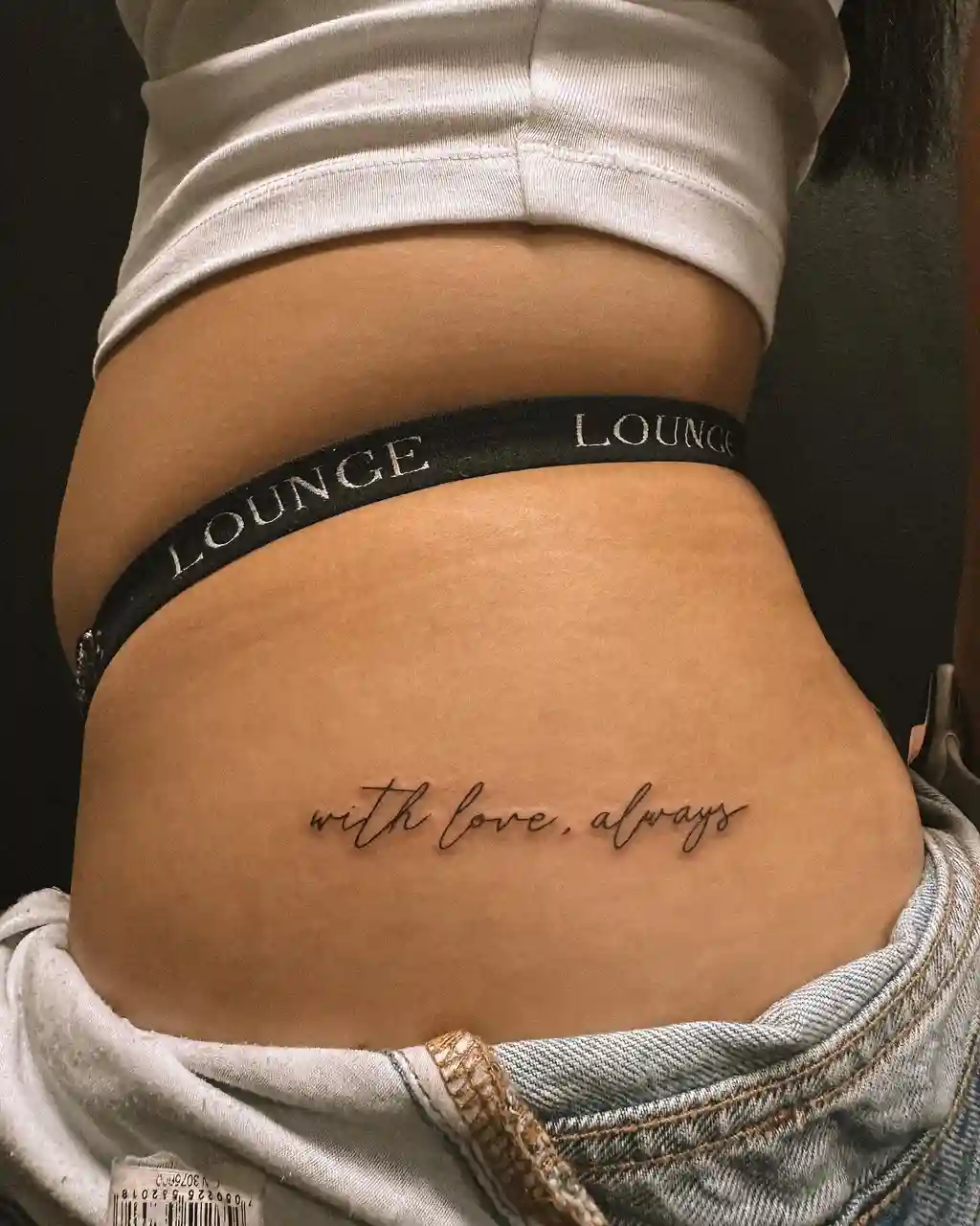 Script Quote Tattoo on Lower Waist