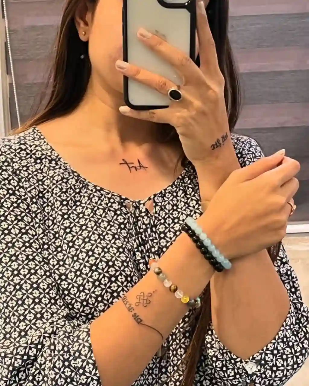 Tiny Symbol Tattoos on Shoulder and Arms