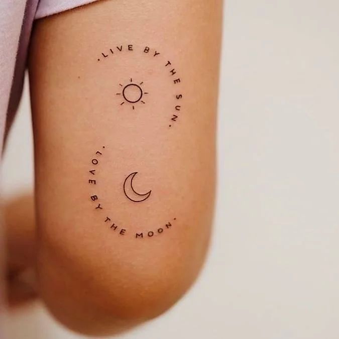 Sun and Moon Tattoo on Upper Arm