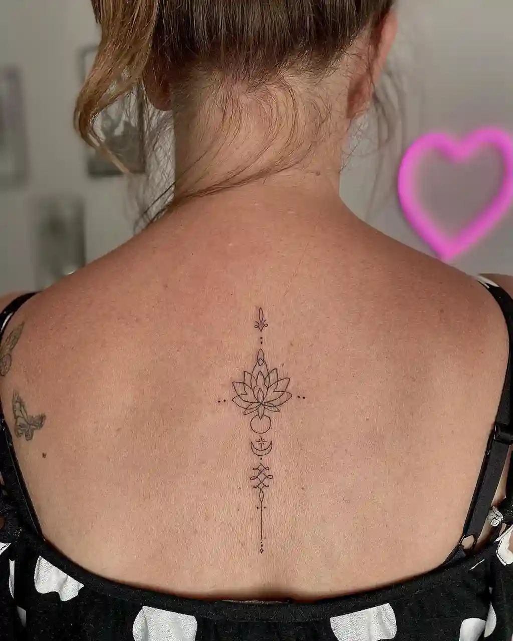 Minimal Lotus Spine Back Tattoo for Women