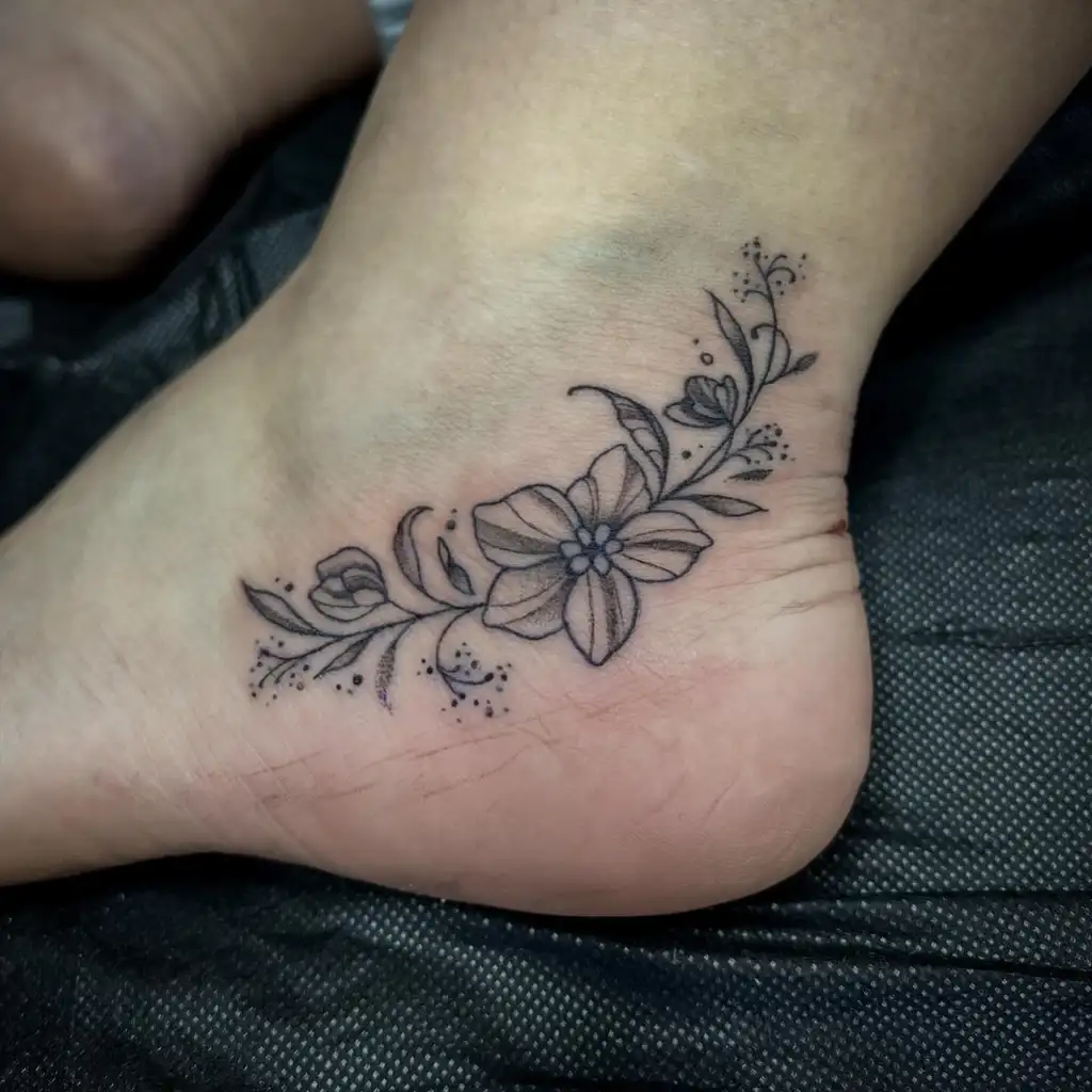 Elegant Floral Vine Foot Tattoos for Women