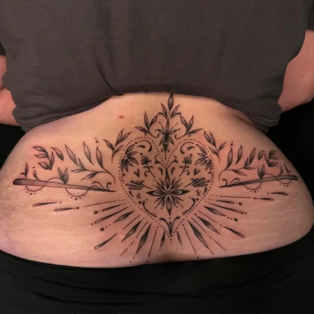 Radiant Floral Heart Design Lower Back Tattoos for Women