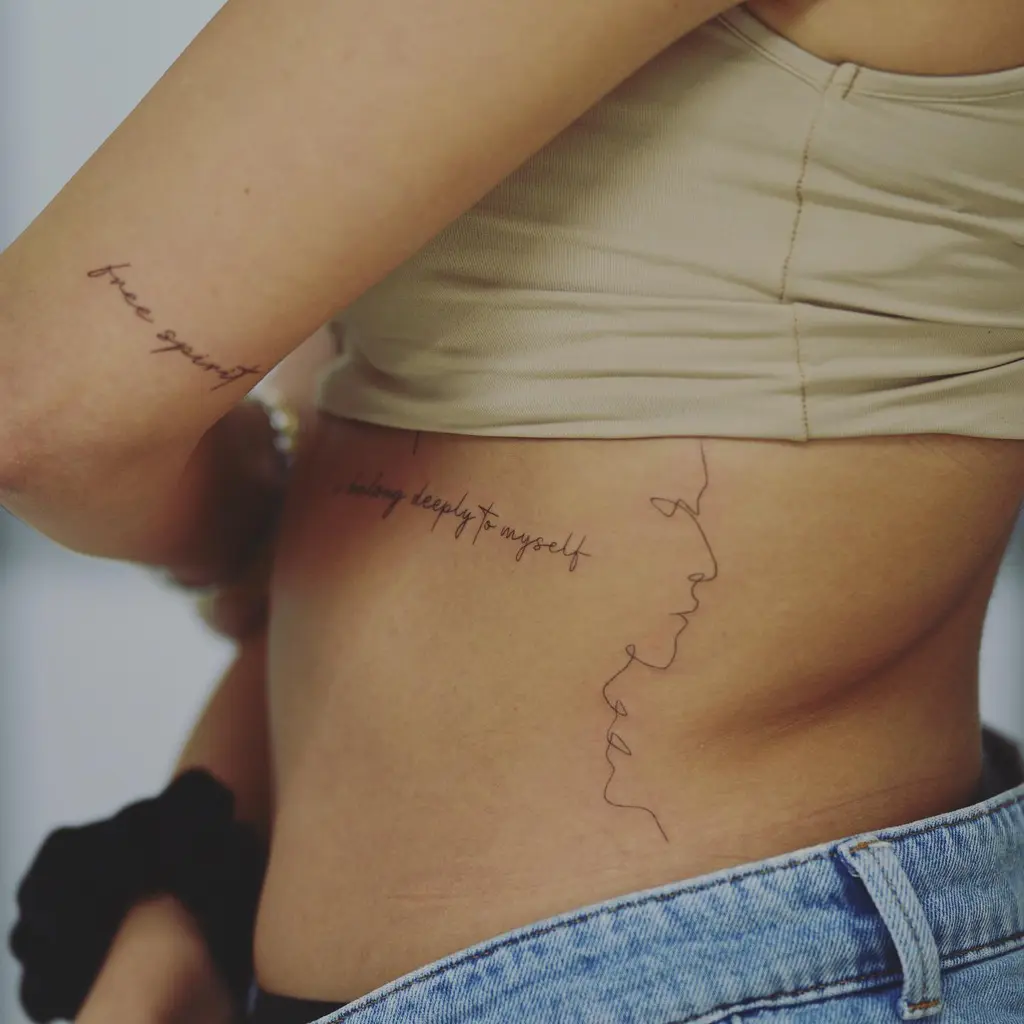 Deep Reflection Faces Rib Tattoos for Women