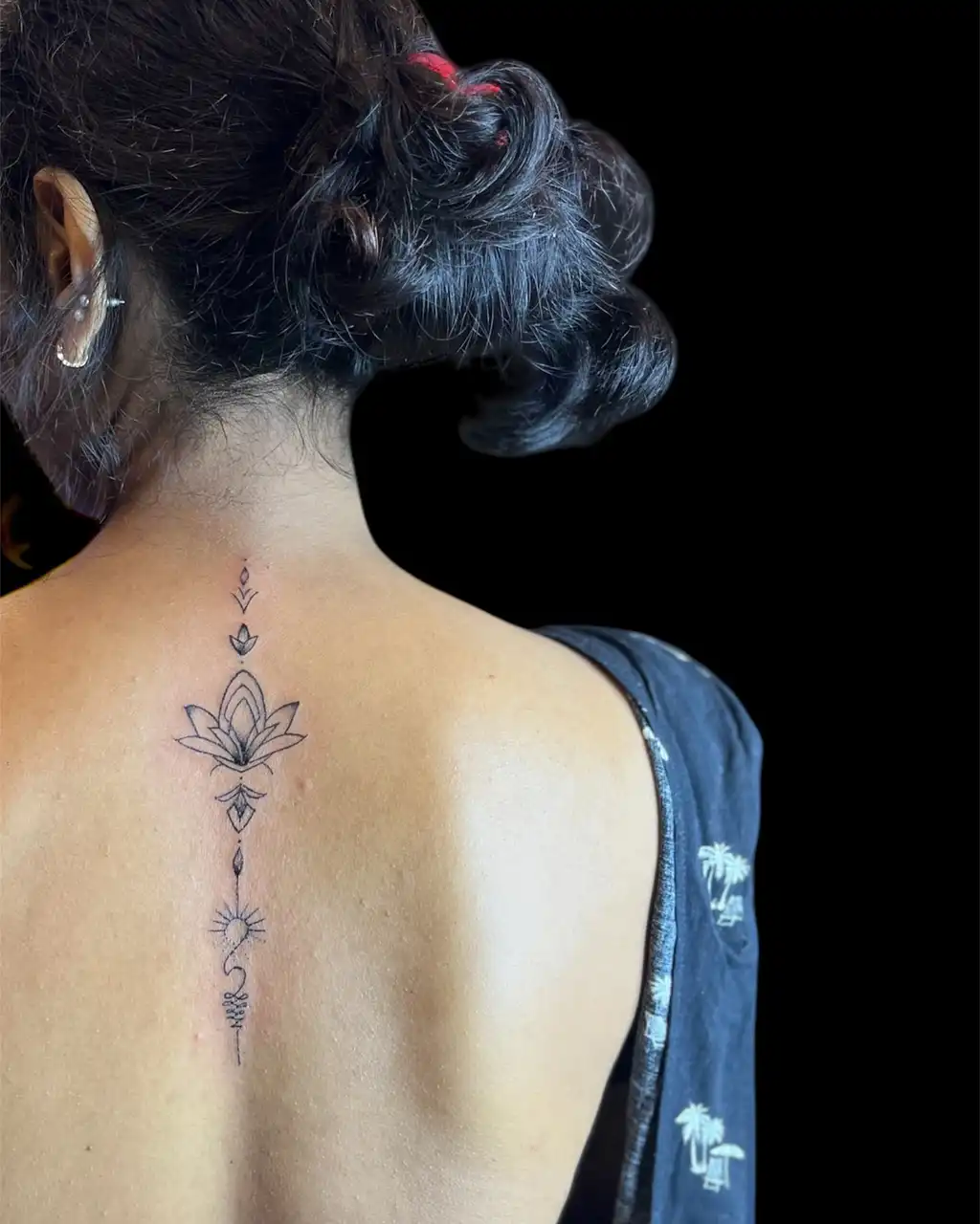 Small Floral Back Tattoo for Women