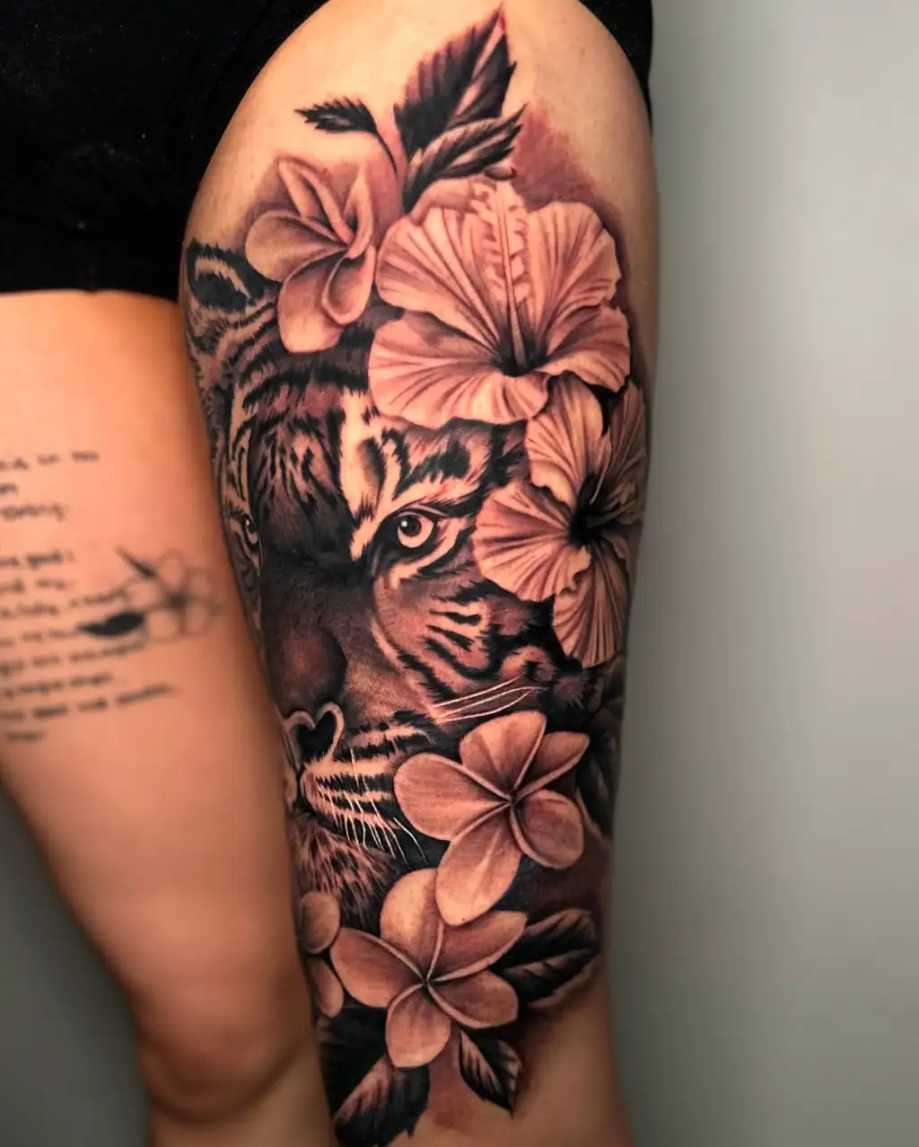 Fierce Tiger Thigh Tattoos for Women