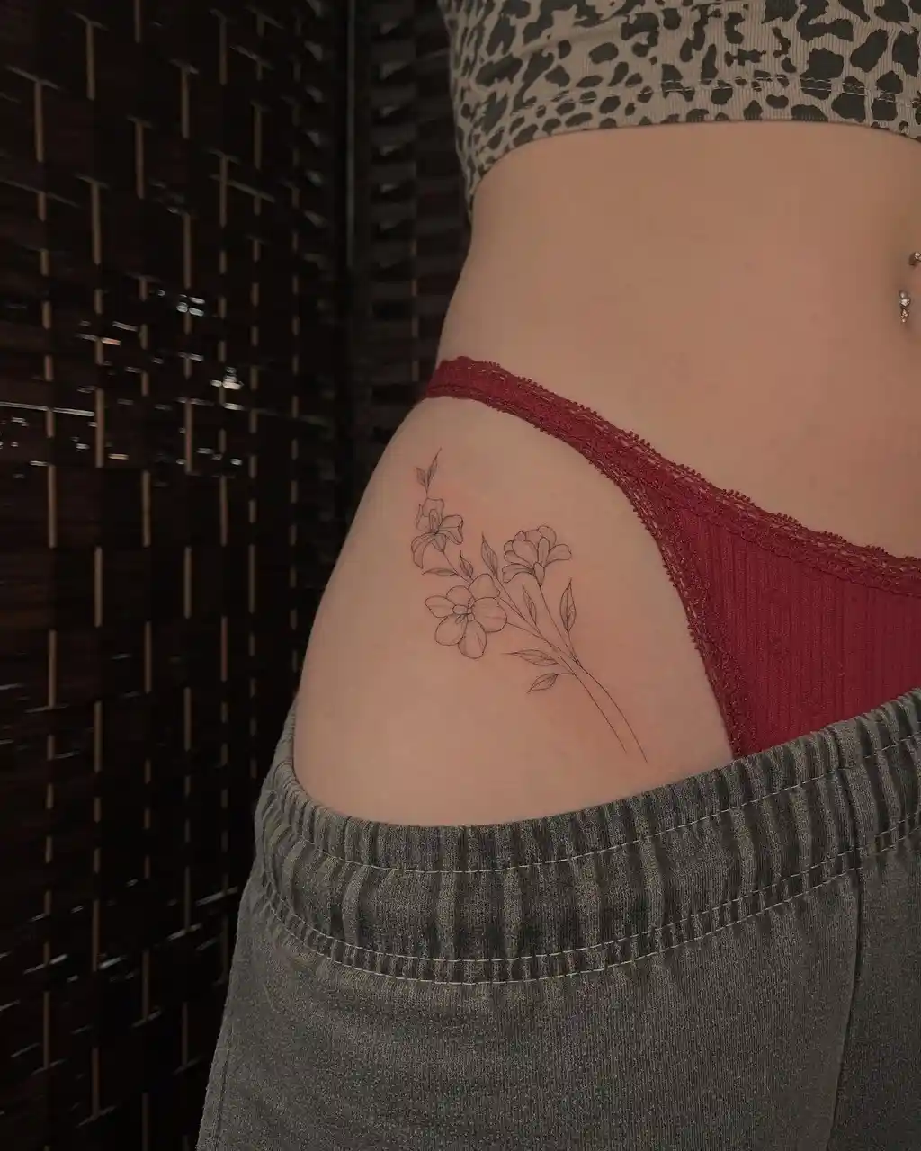 Delicate Wildflower Outline Hip Tattoos Women