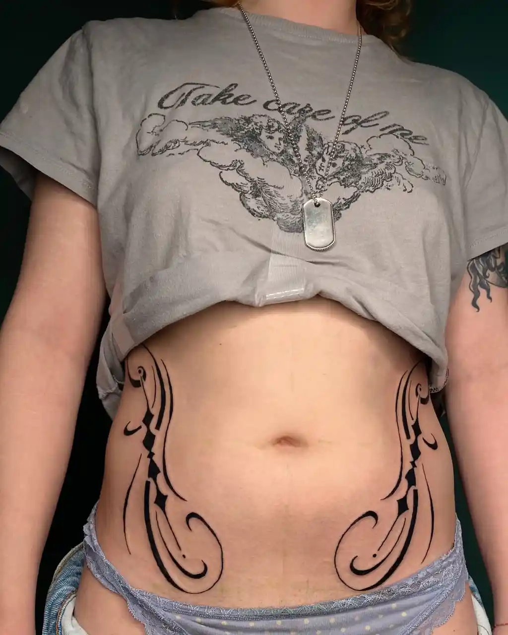 Bold Tribal Curve Stomach Tattoos Women