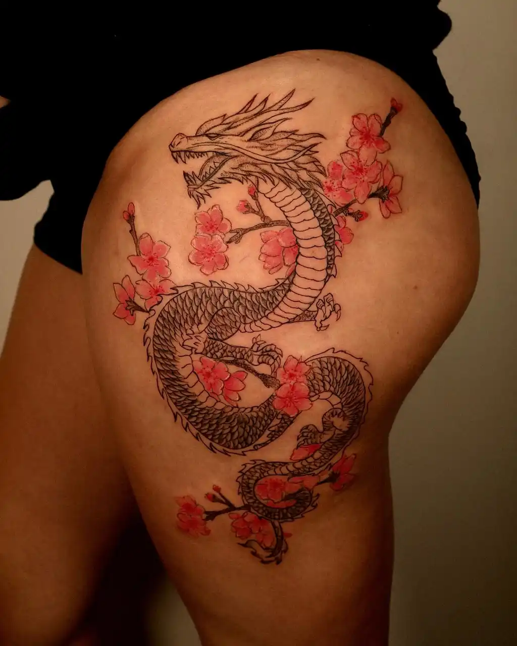 Dragon Blossom Thigh Tattoos for Women