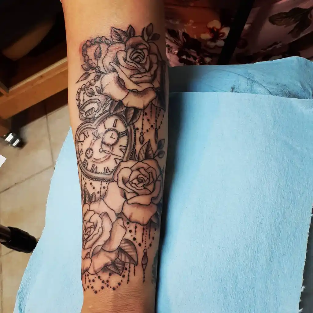 Portrait and Rose Arm Tattoos for Women