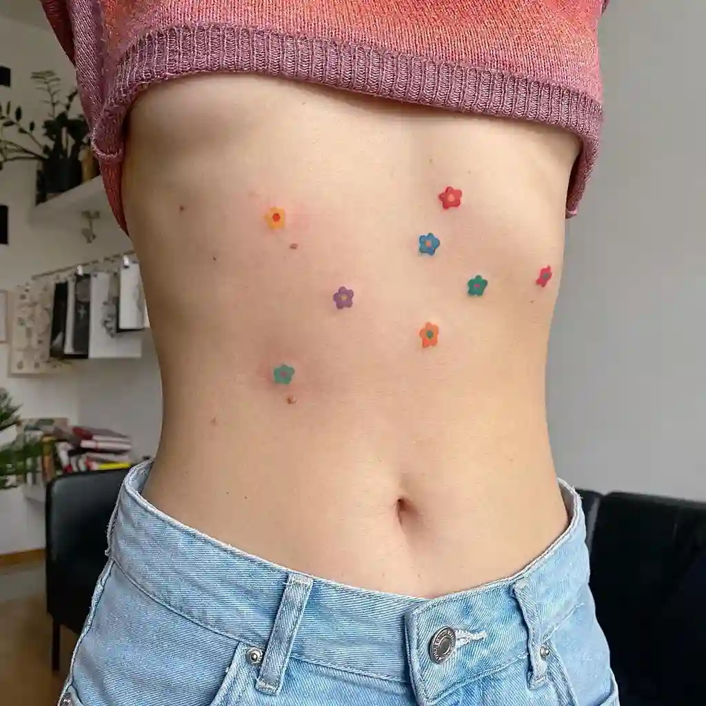 Tiny Colorful Blooms Stomach Tattoos Women