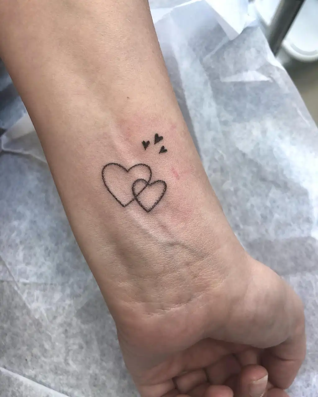 Intertwined Hearts Wrist Tattoo for Women