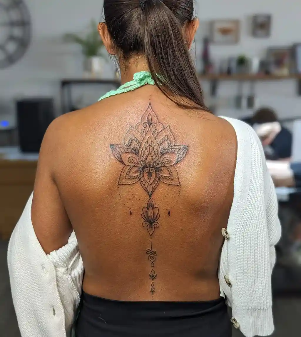 Sacred Bloom Symbol Back Tattoo for Women