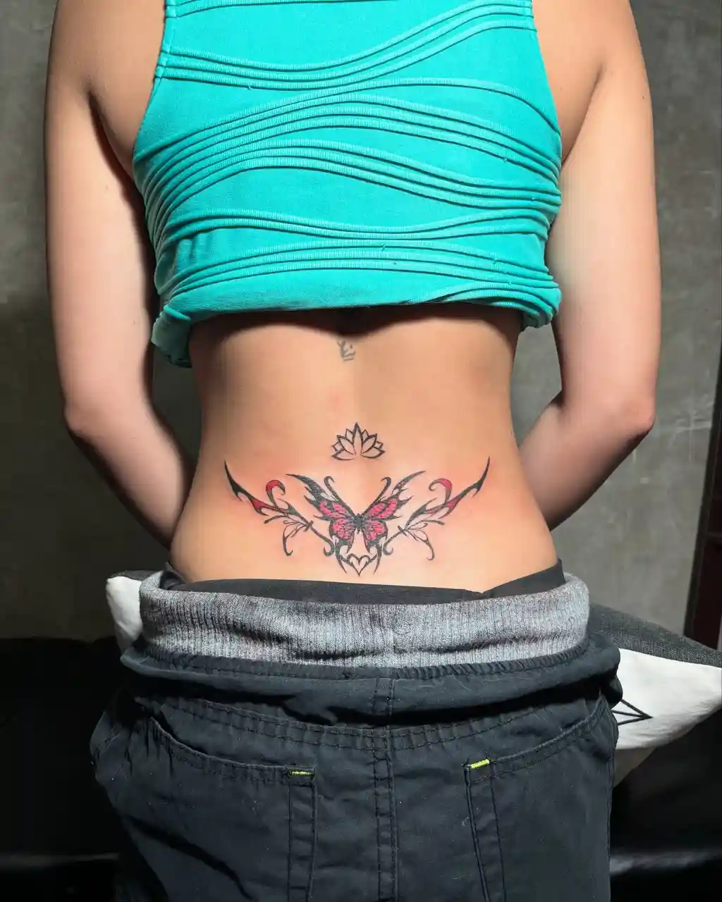 Lower Back Tribal Butterfly Tattoo