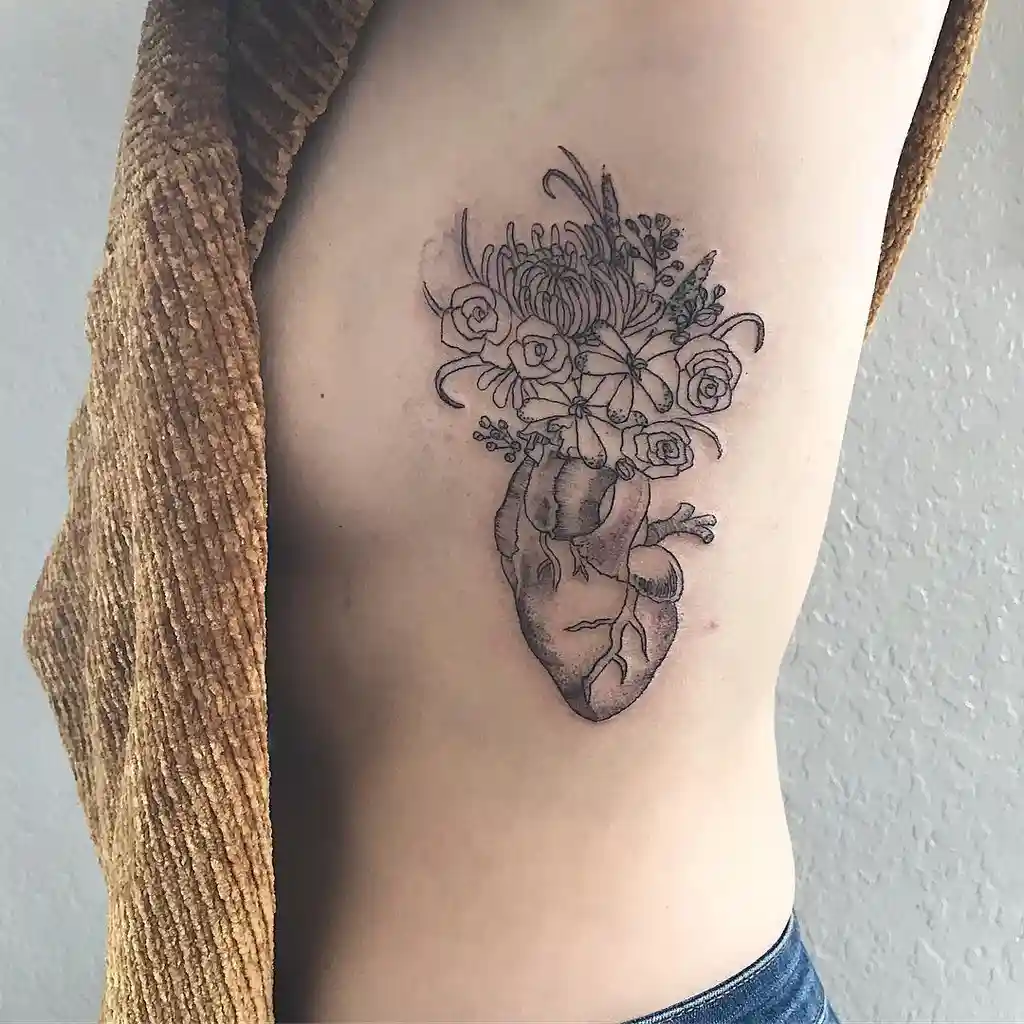 Heart in Bloom Rib Tattoos for Women