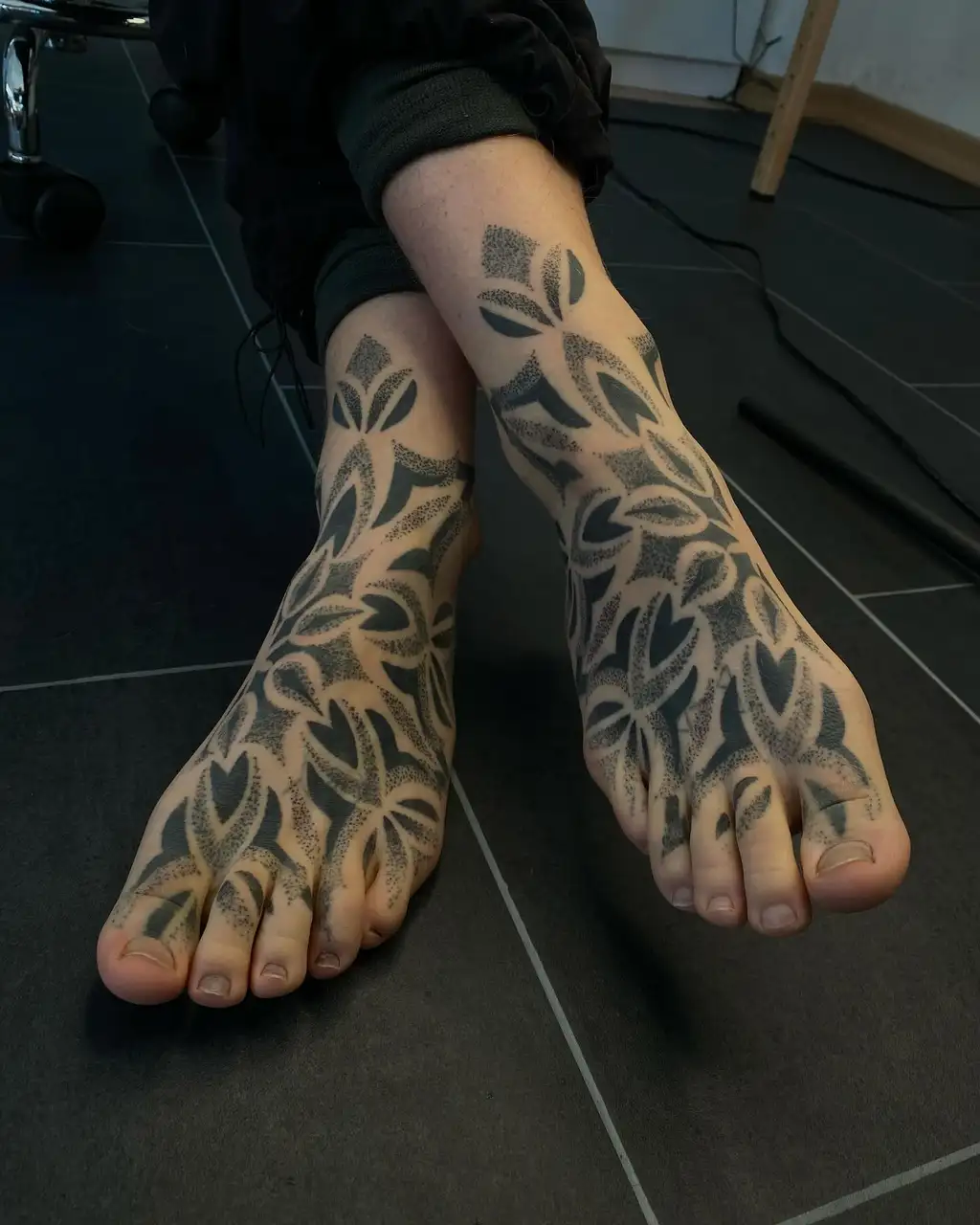 Bold Ornamental Foot Tattoos for Women