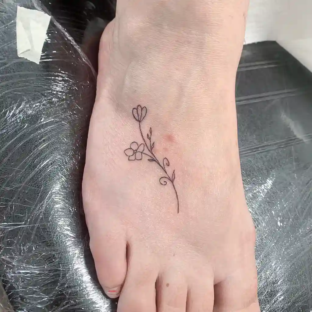 Minimal Floral Vine Foot Tattoos for Women