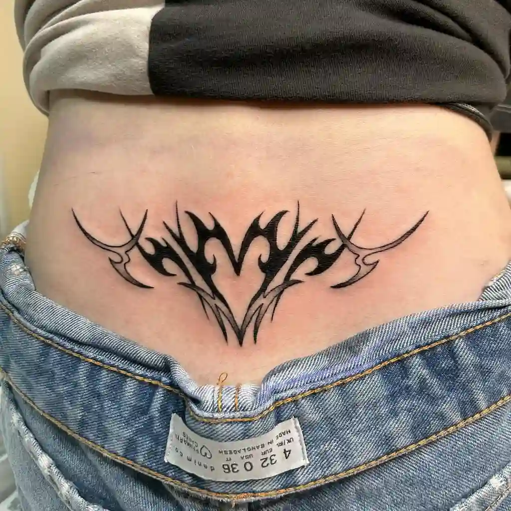 Lower Back Flame Heart Tattoo