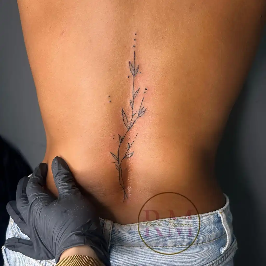 Simple Leaf Spine Back Tattoo for Women
