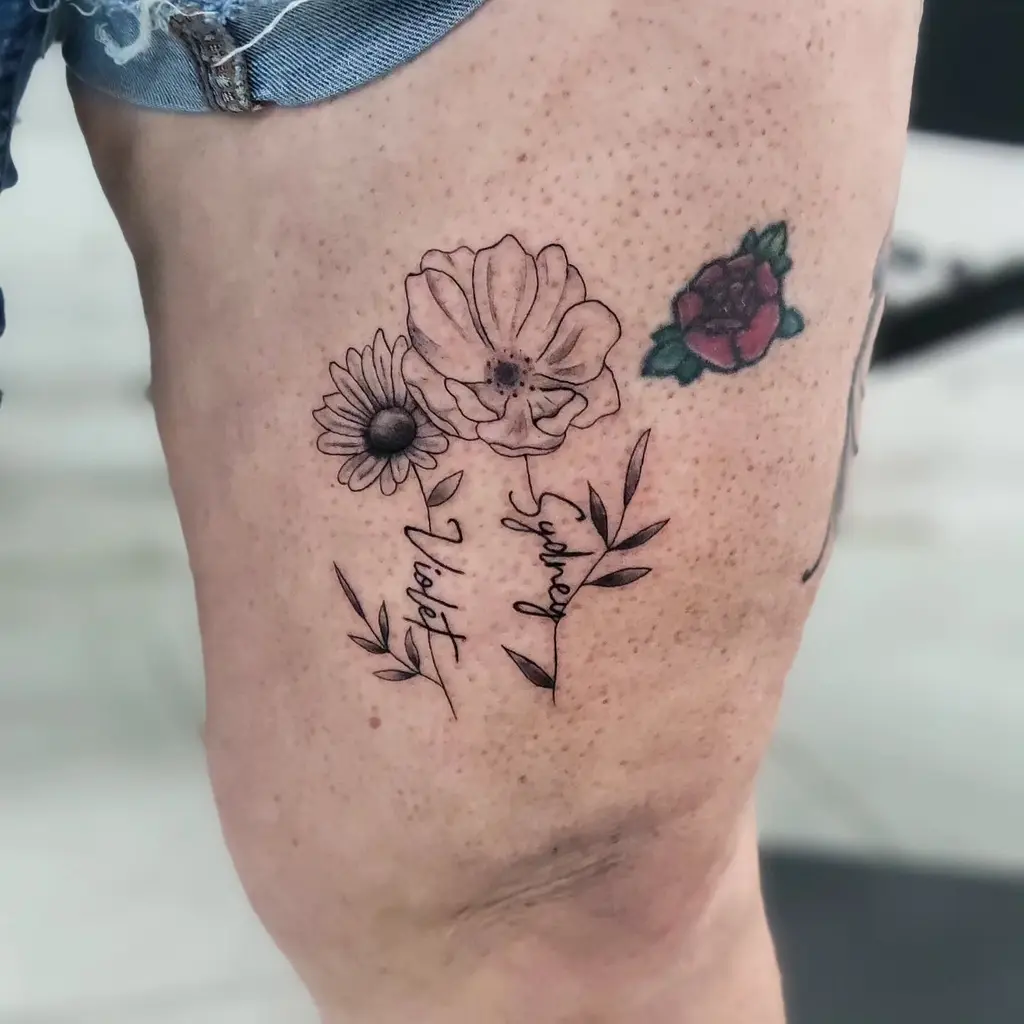 Personalized Floral Script Thigh Tattoos for Women