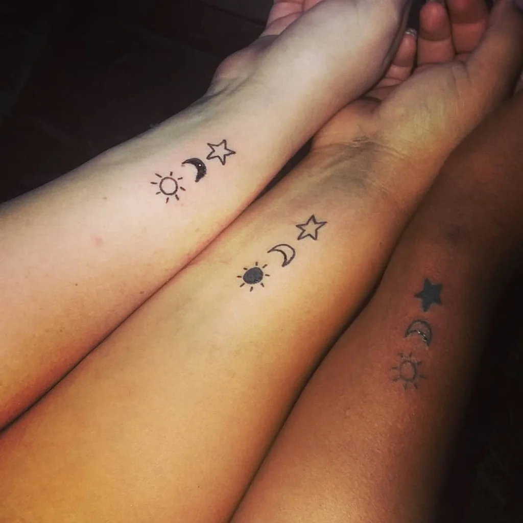 Matching Sun, Moon & Star Wrist Tattoos
