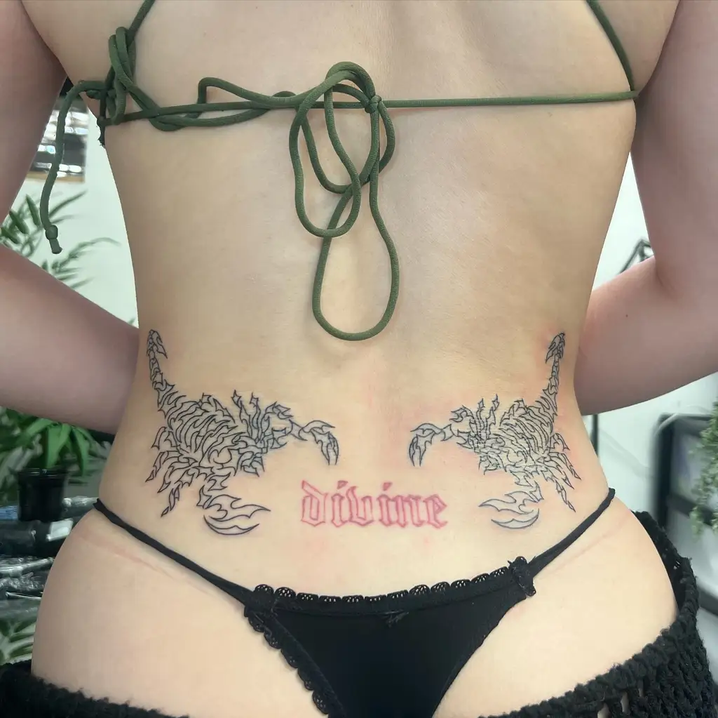 Lower Back Scorpions and Divine Text Tattoo