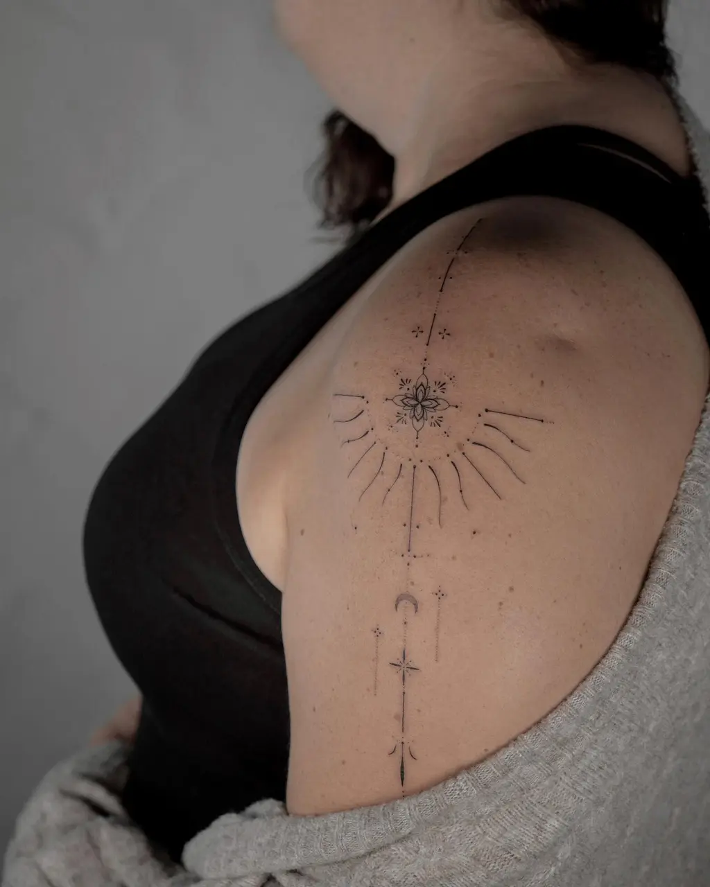 Geometric Sacred Shoulder Tattoos for Women