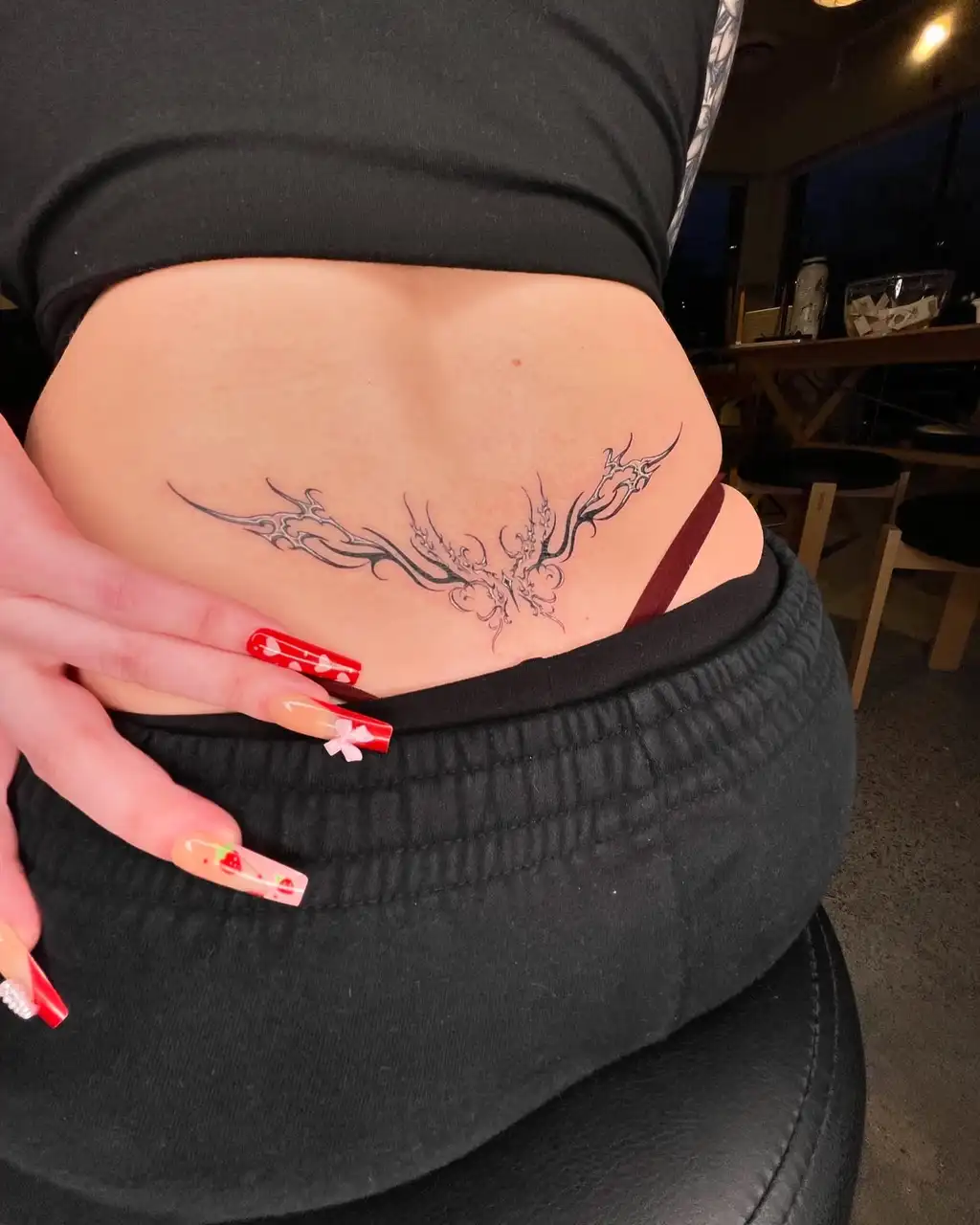 Lower Back Ornamental Wings Tattoo