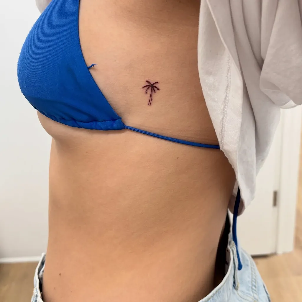 Tiny Palm Rib Tattoos for Women