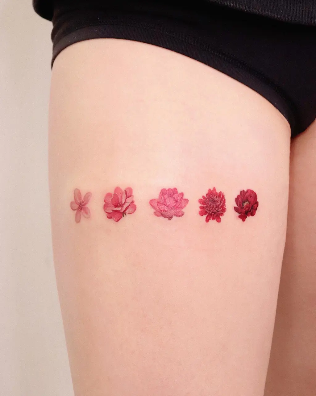 Gradient Bloom Thigh Tattoos for Women