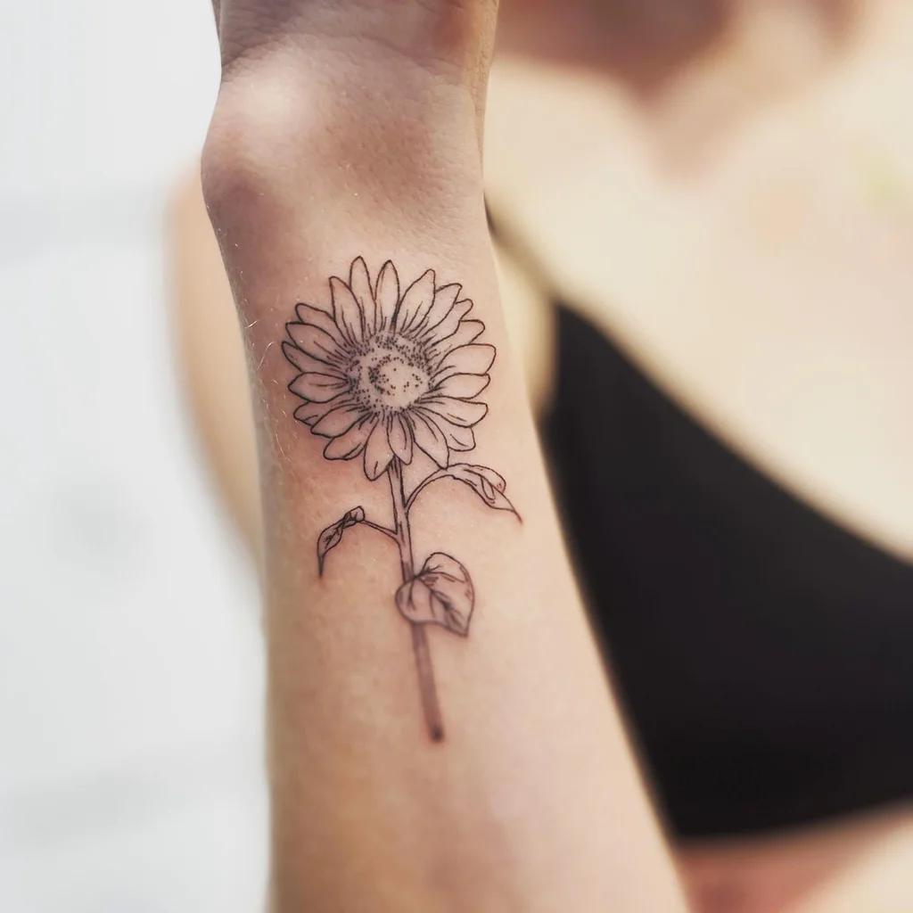 Delicate Sunflower Line Art Wrist Tattoo for Women