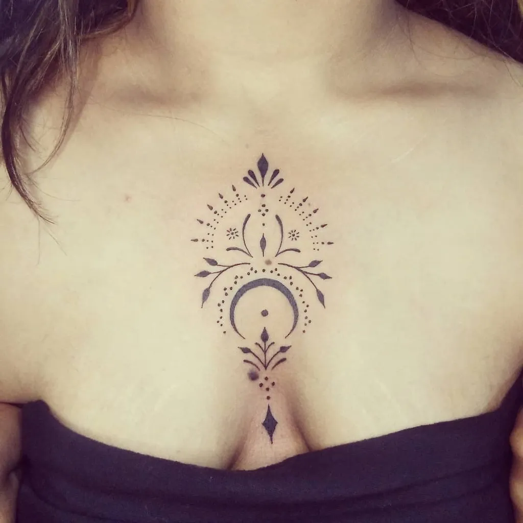 Chest Tattoo Female Featuring Crescent Moon and Floral Elements