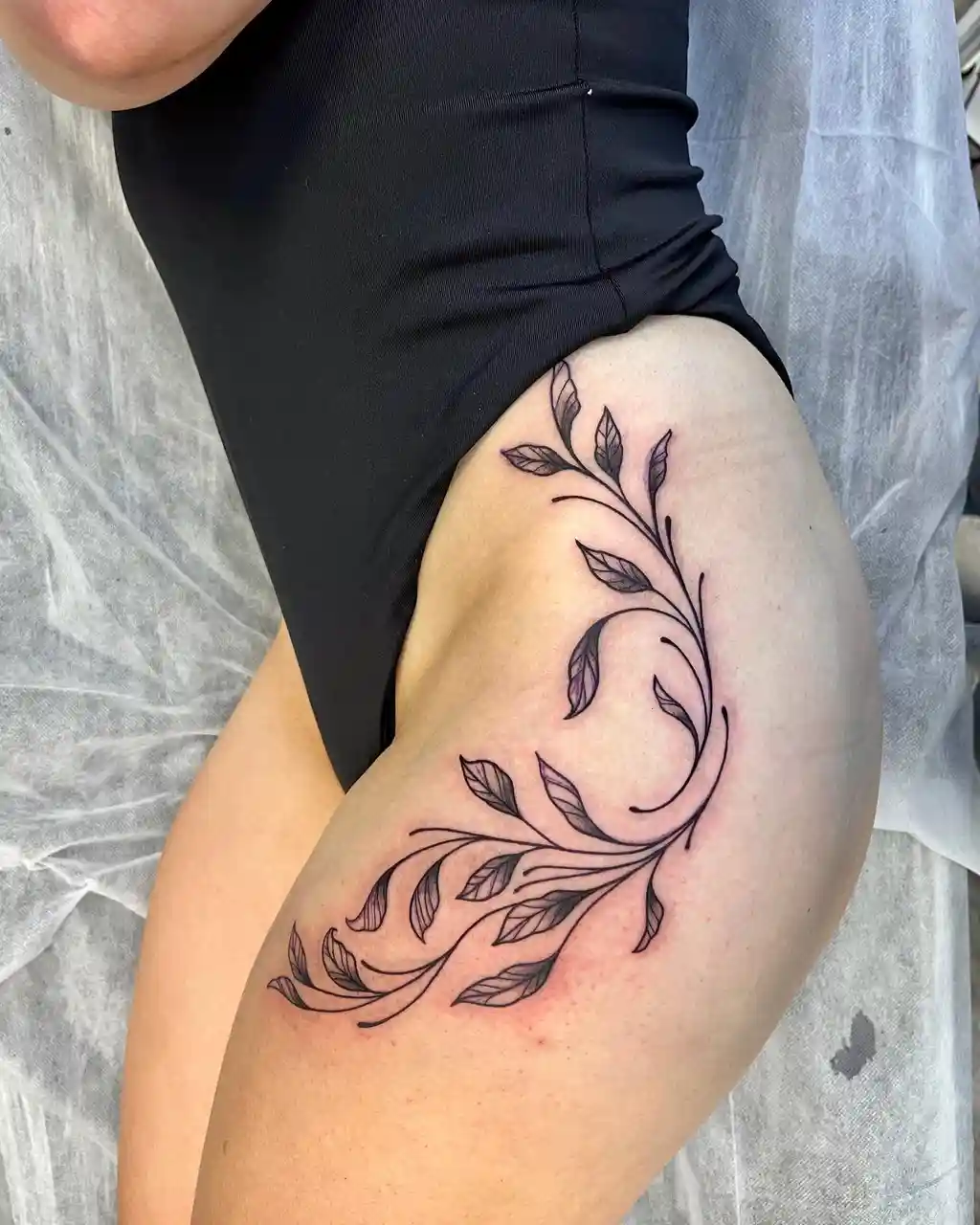 Leafy Vine Thigh Tattoos for Women
