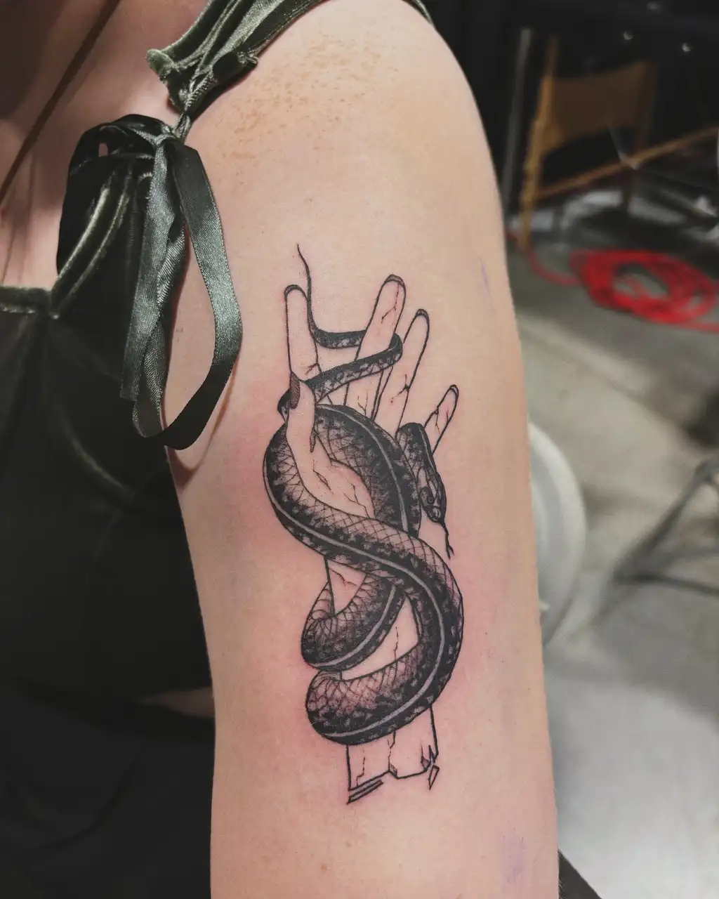 Serpent Grip Upper Arm Tattoos for Women
