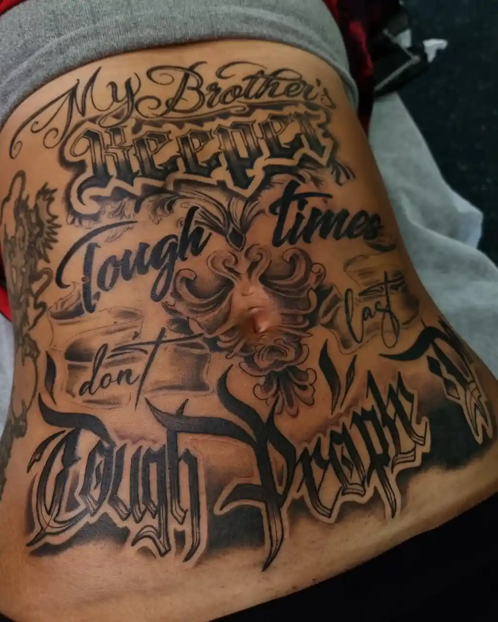 Bold Lettered Quote Stomach Tattoos Women