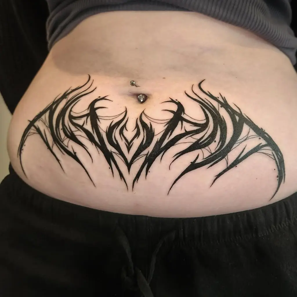 Abstract Flame Lettering Stomach Tattoos Women