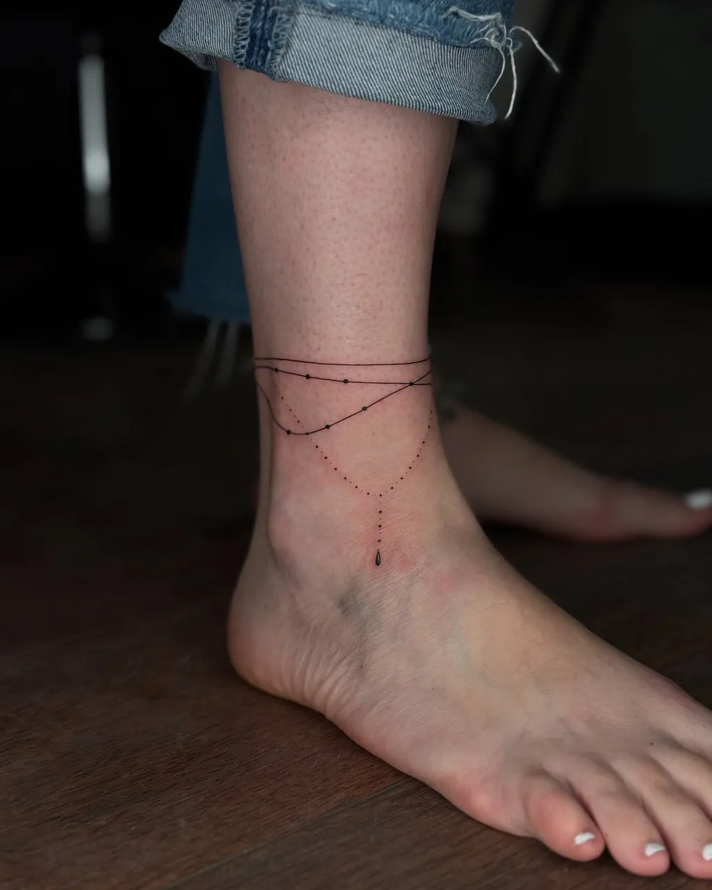 Chain-Inspired Ankle Tattoos for Women