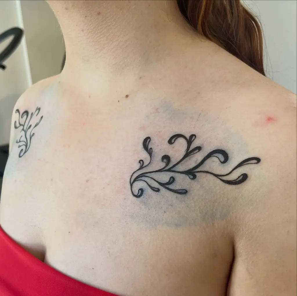 Bold Swirl Collarbone Tattoos for Women