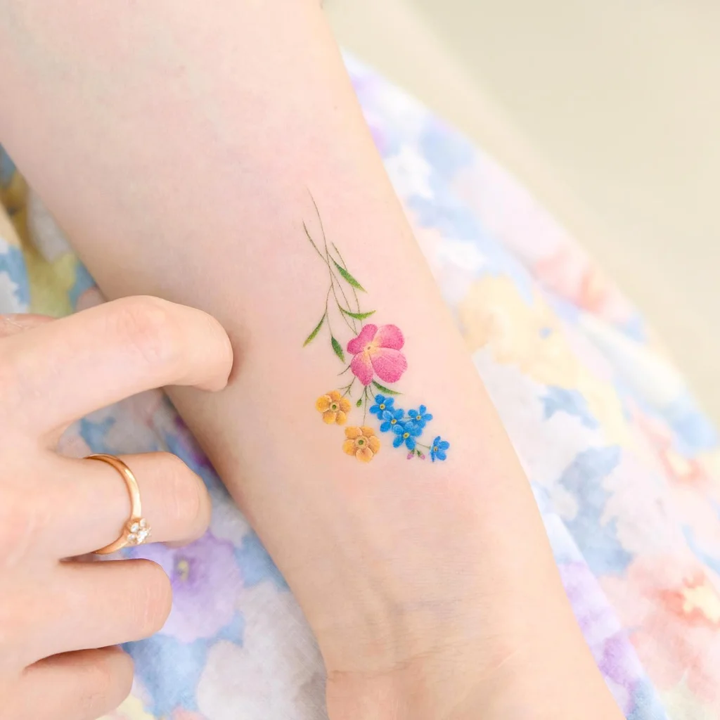 Colorful Wildflower Bunch Wrist Tattoo for Women