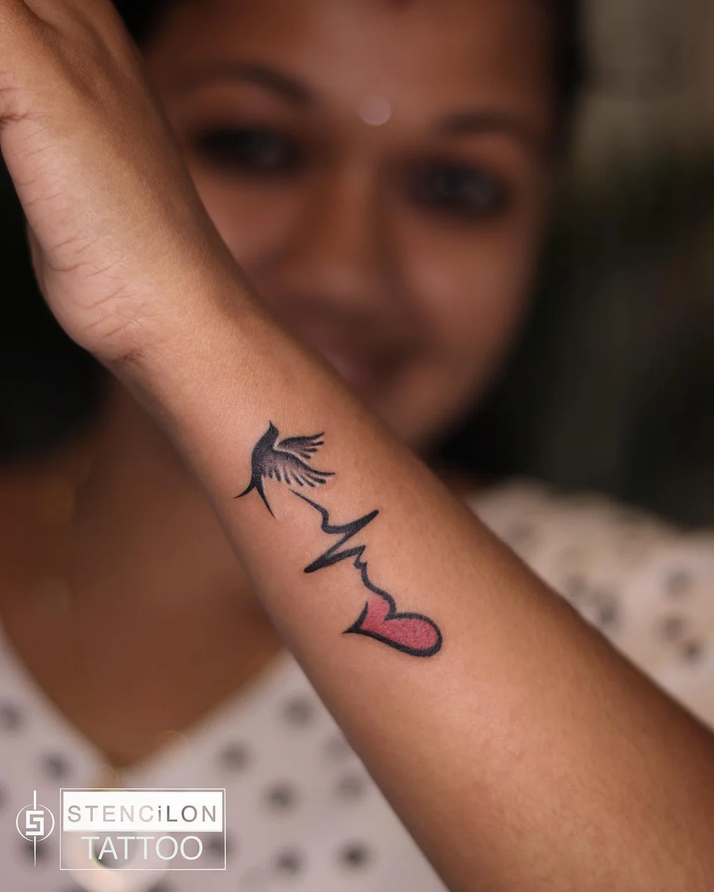 Flying Bird with Heartbeat and Heart Wrist Tattoo