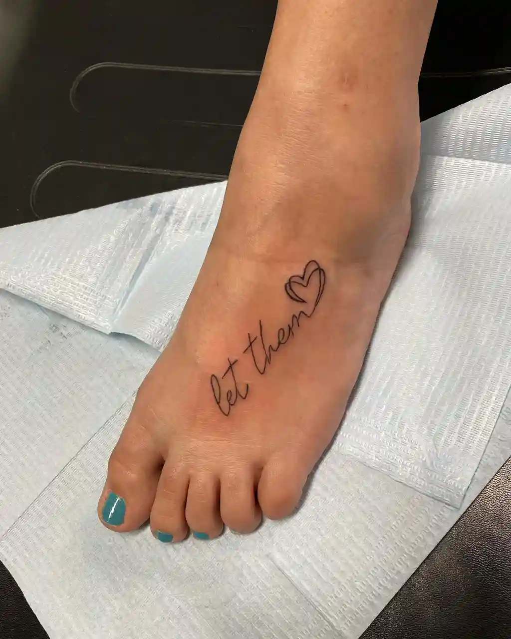 Minimal Script Foot Tattoos for Women