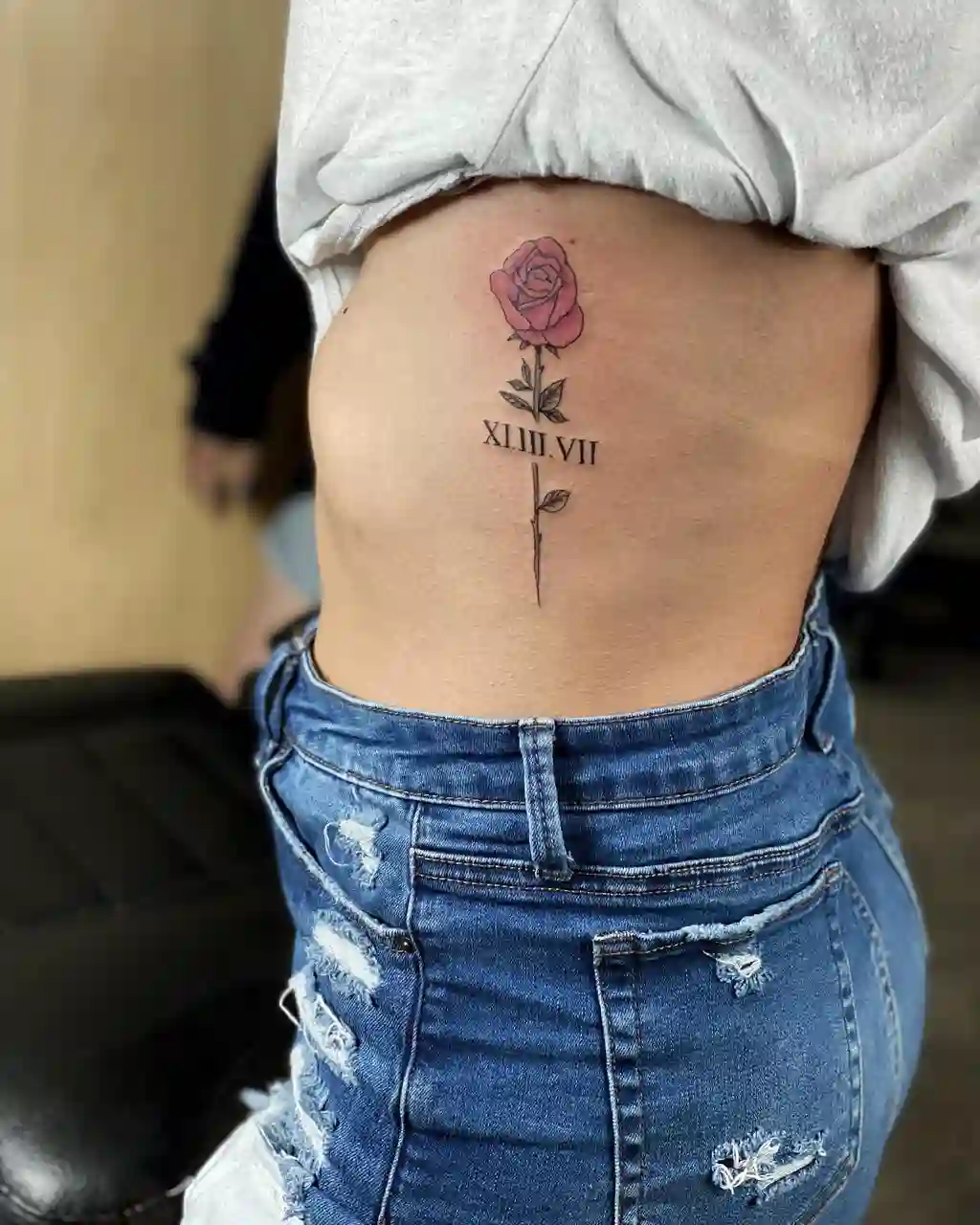 Roman Rose Rib Tattoos for Women