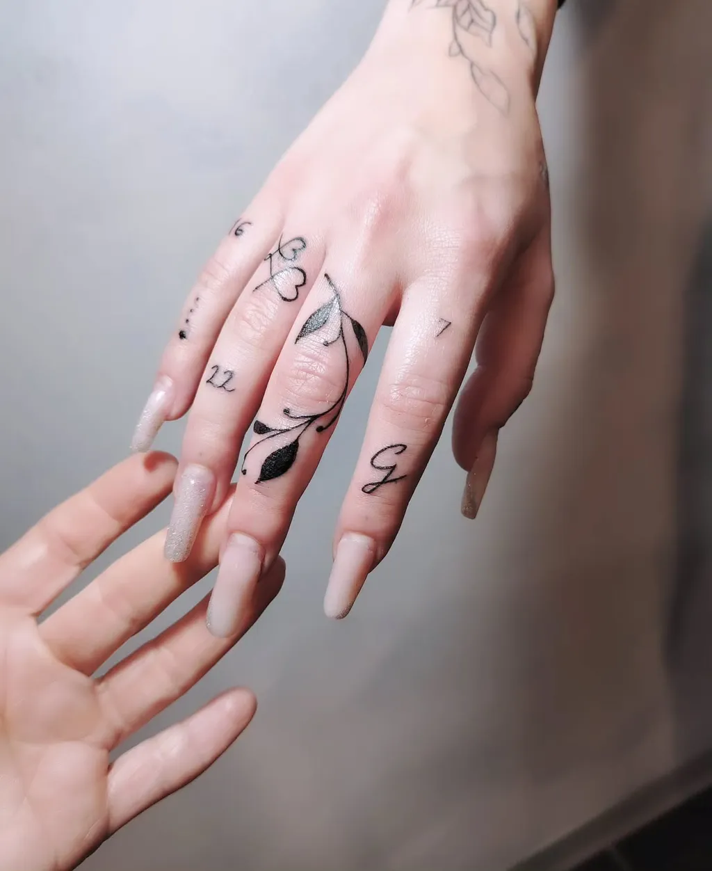 Minimal Script Hand Tattoos for Women