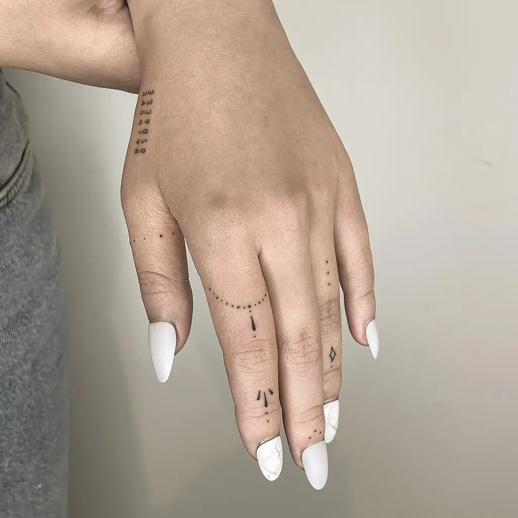 Fine Line Dotwork Hand Tattoos for Women