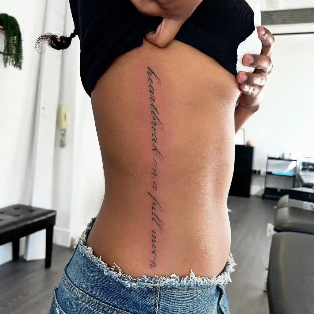 Scripted Quote Rib Tattoos for Women