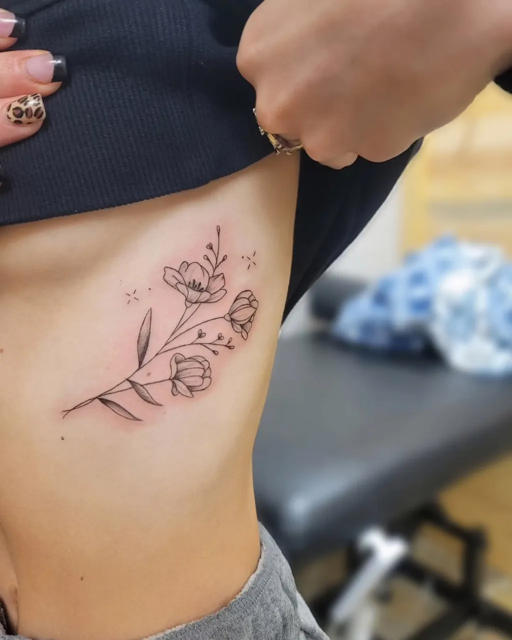 Elegant Floral Rib Tattoos for Women